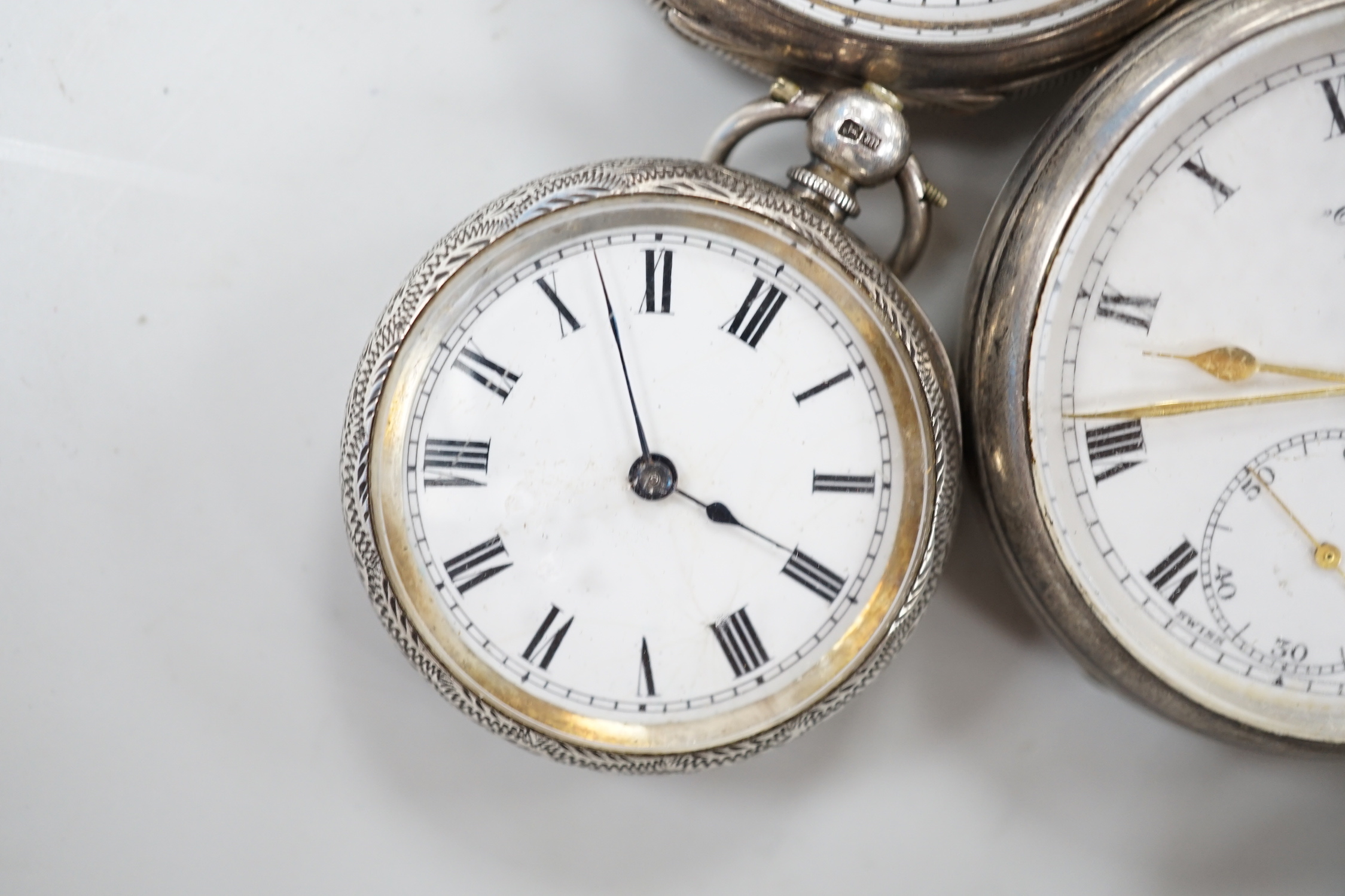 Thirteen assorted pocket and fob watches including silver Exchange and silver J.W. Benson.